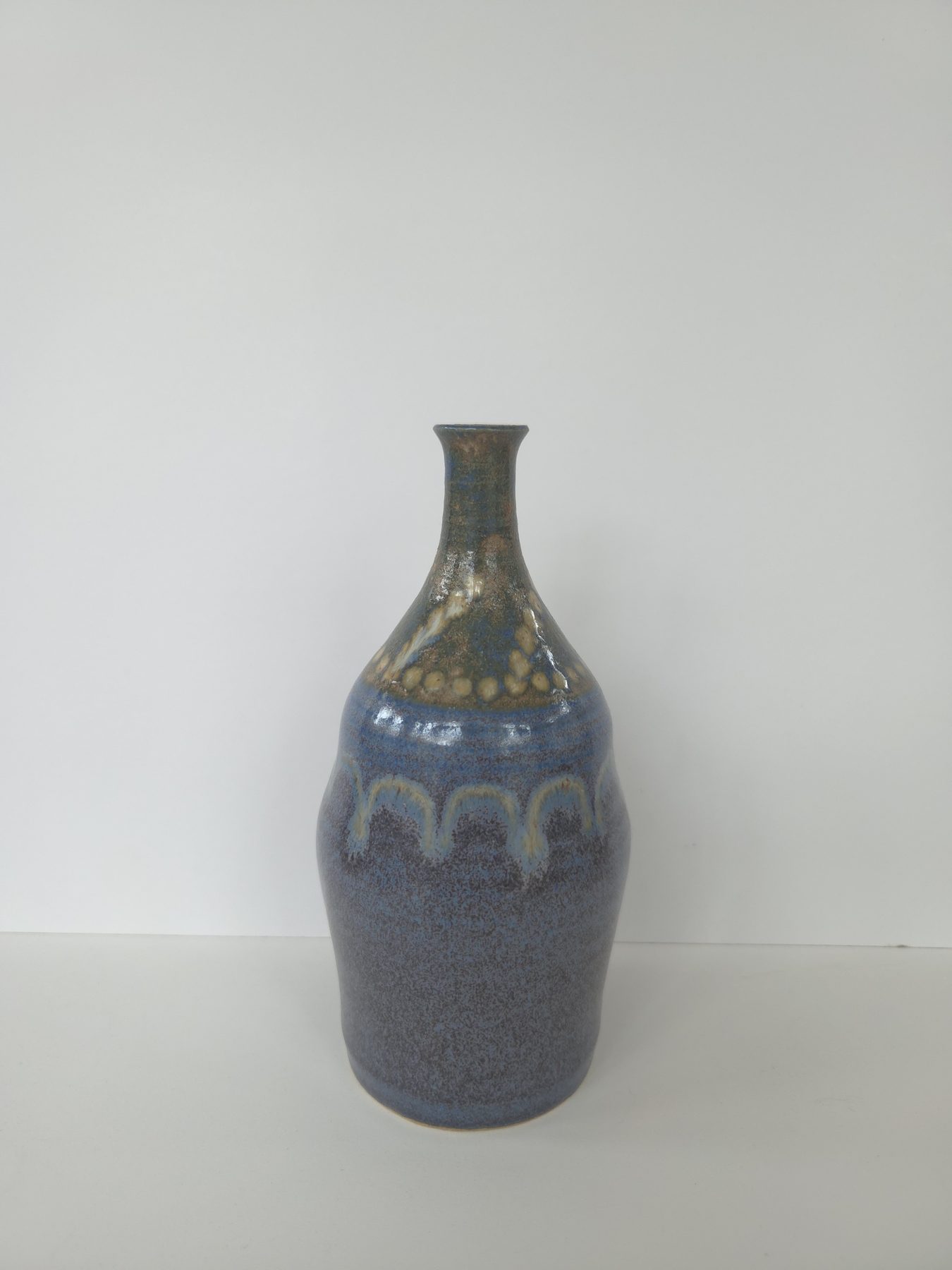 Bottle, Dark blue, ironwood green with cream decoration